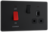 PCDMB70B Front - This Evolve Matt Black 45A cooker control unit from British General includes a 13A socket for an additional appliance outlet, and has flush LED indicators above the socket and switch.