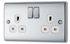 NPC22W Front - This polished chrome finish 13A double switched socket from British General has a sleek and slim profile, with softly rounded edges and no visible plastic around the switch to add a touch of luxury to your decor.