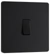 PCDMB13B Front - This Evolve Matt Black 20A 16AX intermediate light switch from British General should be used as the middle switch when you need to operate one light from 3 different locations, such as either end of a hallway and at the top of the stairs.