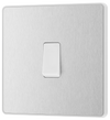 PCDBS13W Front - This Evolve Brushed Steel 20A 16AX intermediate light switch from British General should be used as the middle switch when you need to operate one light from 3 different locations, such as either end of a hallway and at the top of the stairs.