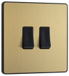 PCDSB42B Front -  This Evolve Satin Brass 20A 16AX double light switch from British General can operate 2 different lights, whilst the 2 way switching allows a second switch to be added to the circuit to operate the same light from another location (e.g. at the top and bottom of the stairs).